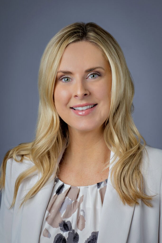 Business woman headshot Headshot of a woman in business attire.